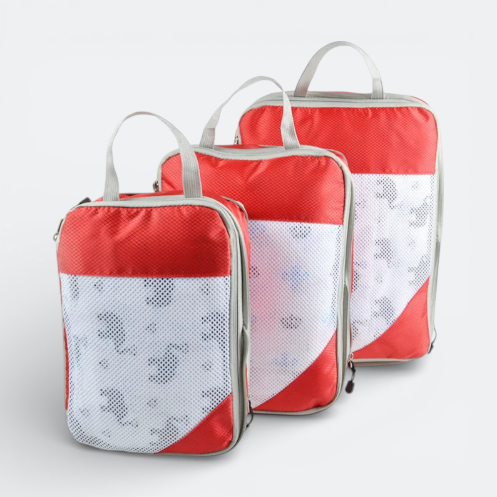 AïtaVia set of 3 red and white mesh packing cubes with handles for cabin luggage organization.