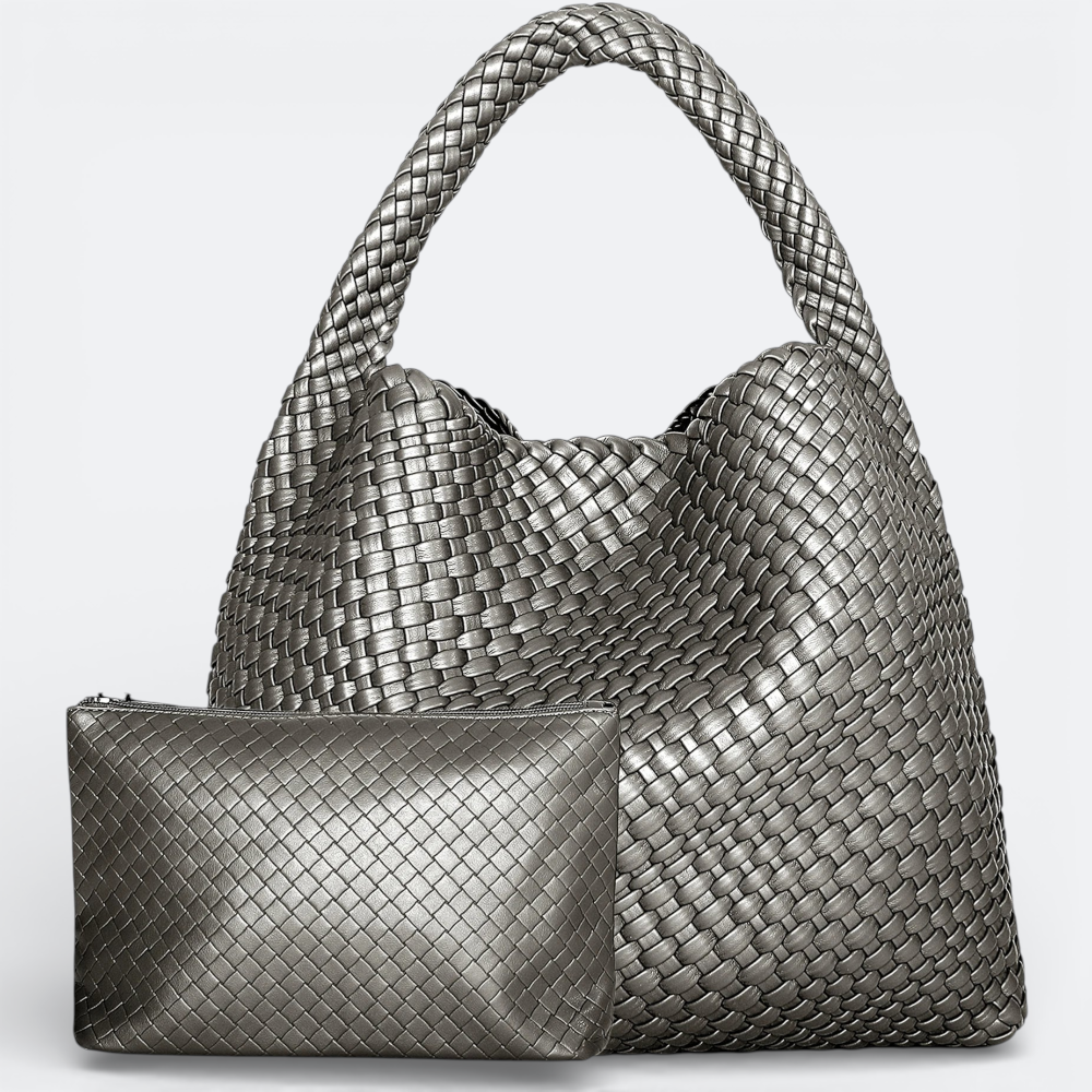 AïtaVia large woven metallic silver leather hobo bag with matching pouch. Ideal for travel and everyday use.