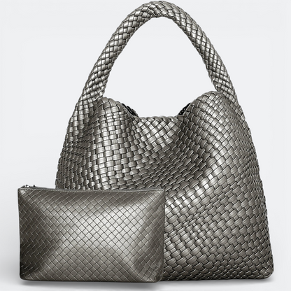 AïtaVia large woven metallic silver leather hobo bag with matching pouch. Ideal for travel and everyday use.