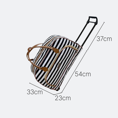 AïtaVia black and white striped travel duffel bag with brown leather accents and telescopic handle.