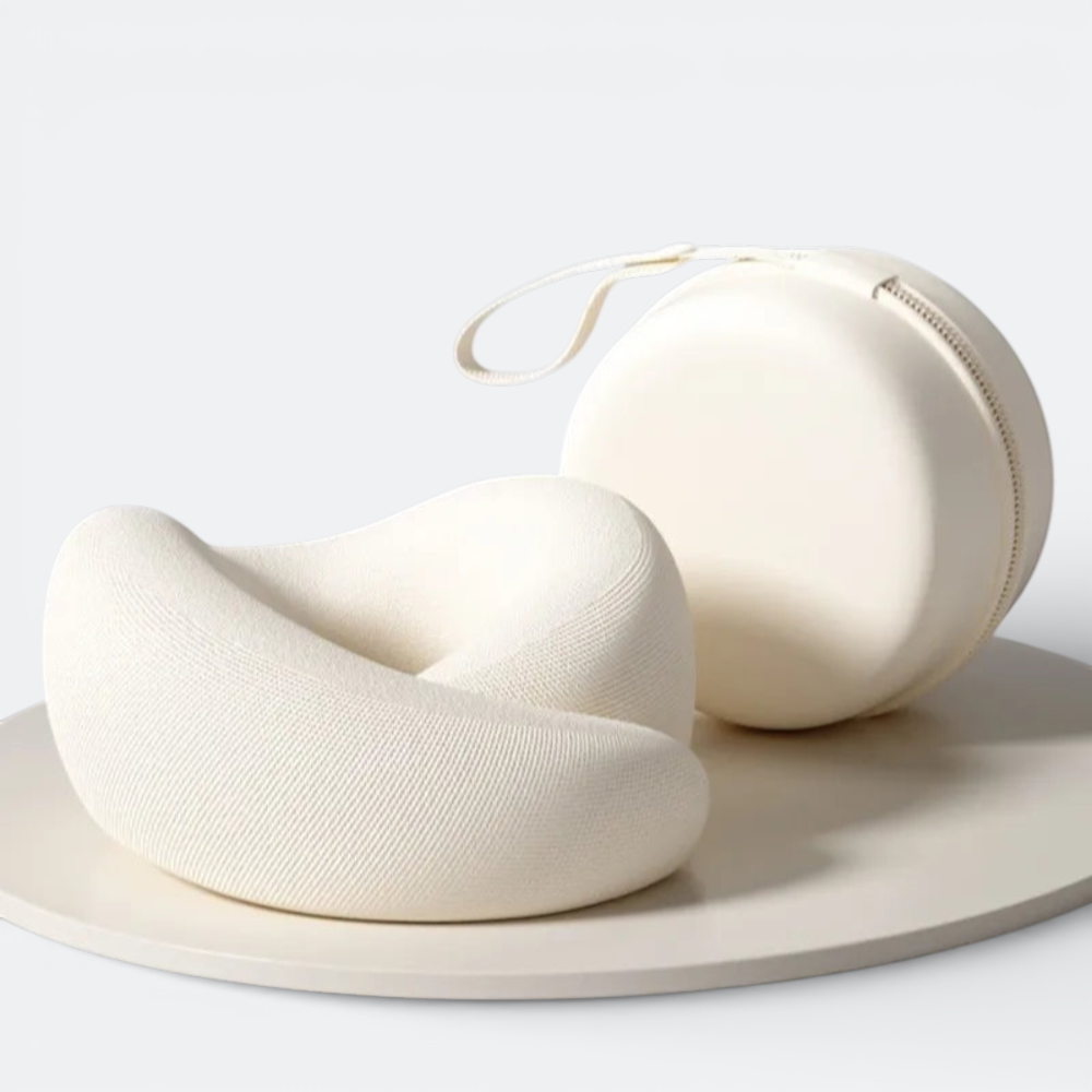 AïtaVia white ergonomic travel neck pillow with a matching carrying case. Soft knit fabric for comfortable support.