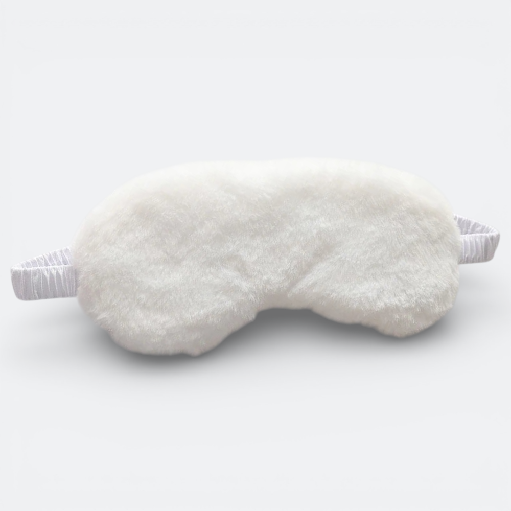 AïtaVia white plush sleep mask with elastic strap for travel and comfort.